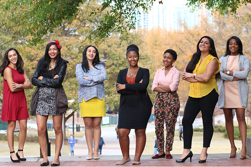 A roup of GT women leader students posing on campus.